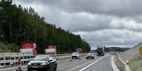 The D3 motorway near the Austrian border is finished in half, behind the crash barriers is still being built