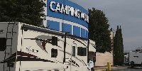Camping World CEO vows to keep flying oversized flag despite daily fines