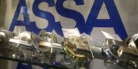 Lockmaker Assa Abloy boosts dividend, but wary on outlook