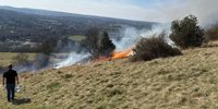 Photos as firefighters tackle fire at Surrey National Trust beauty spot caused by disposable BBQ -