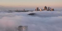 Flights delayed, ferries cancelled, road alerts as fog blankets Sydney | The Australian