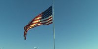 Sevierville sends notice to Camping World CEO to take down flag pole with giant American flag